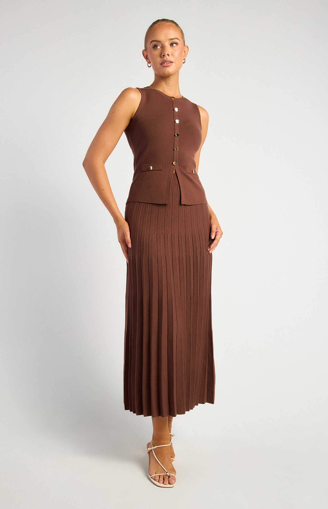 Gold Button Knit Vest And Pleated A-Line Skirt Set